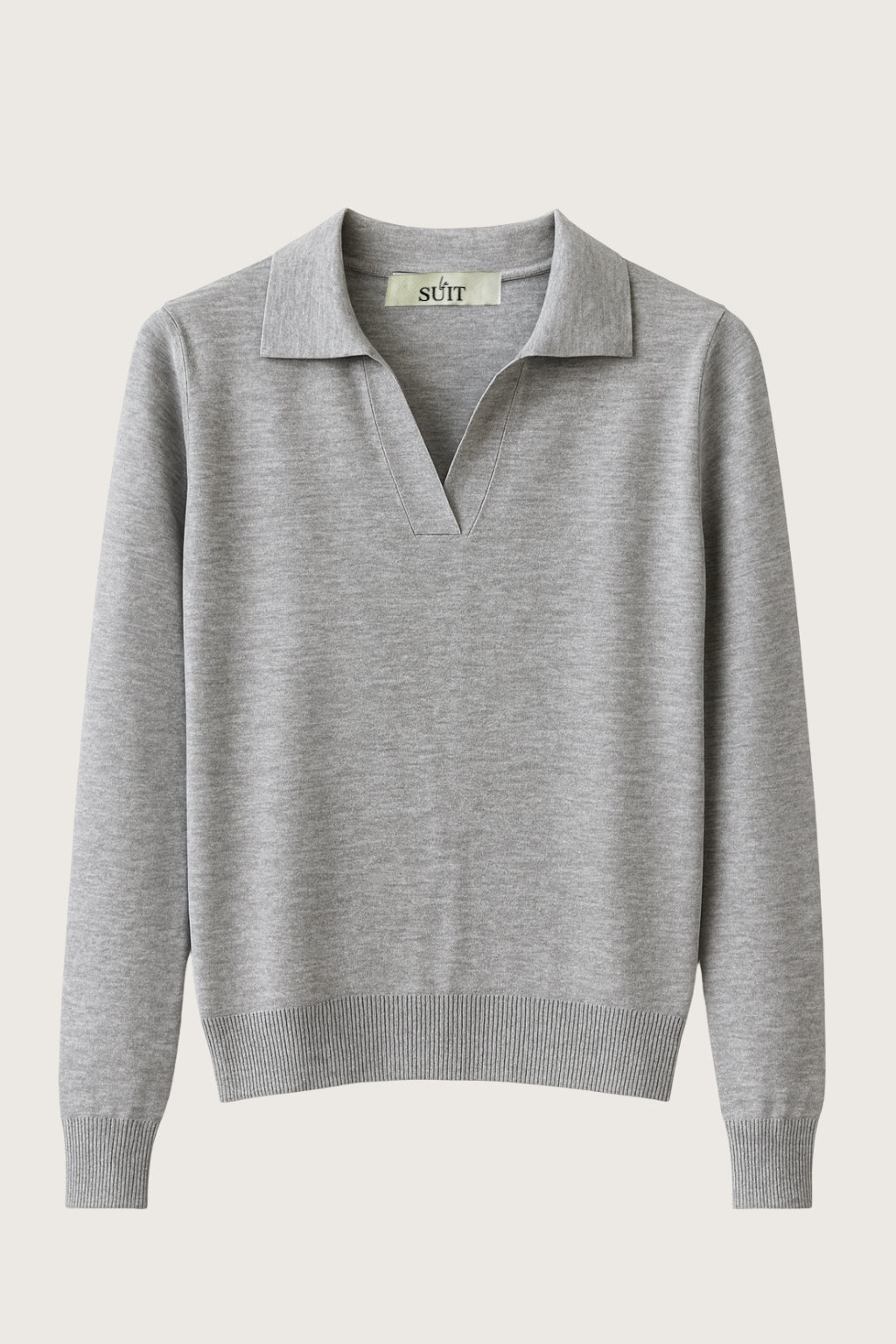 Grå langærmet polo minimalistisk luksus og tidløs elegance i ét design.