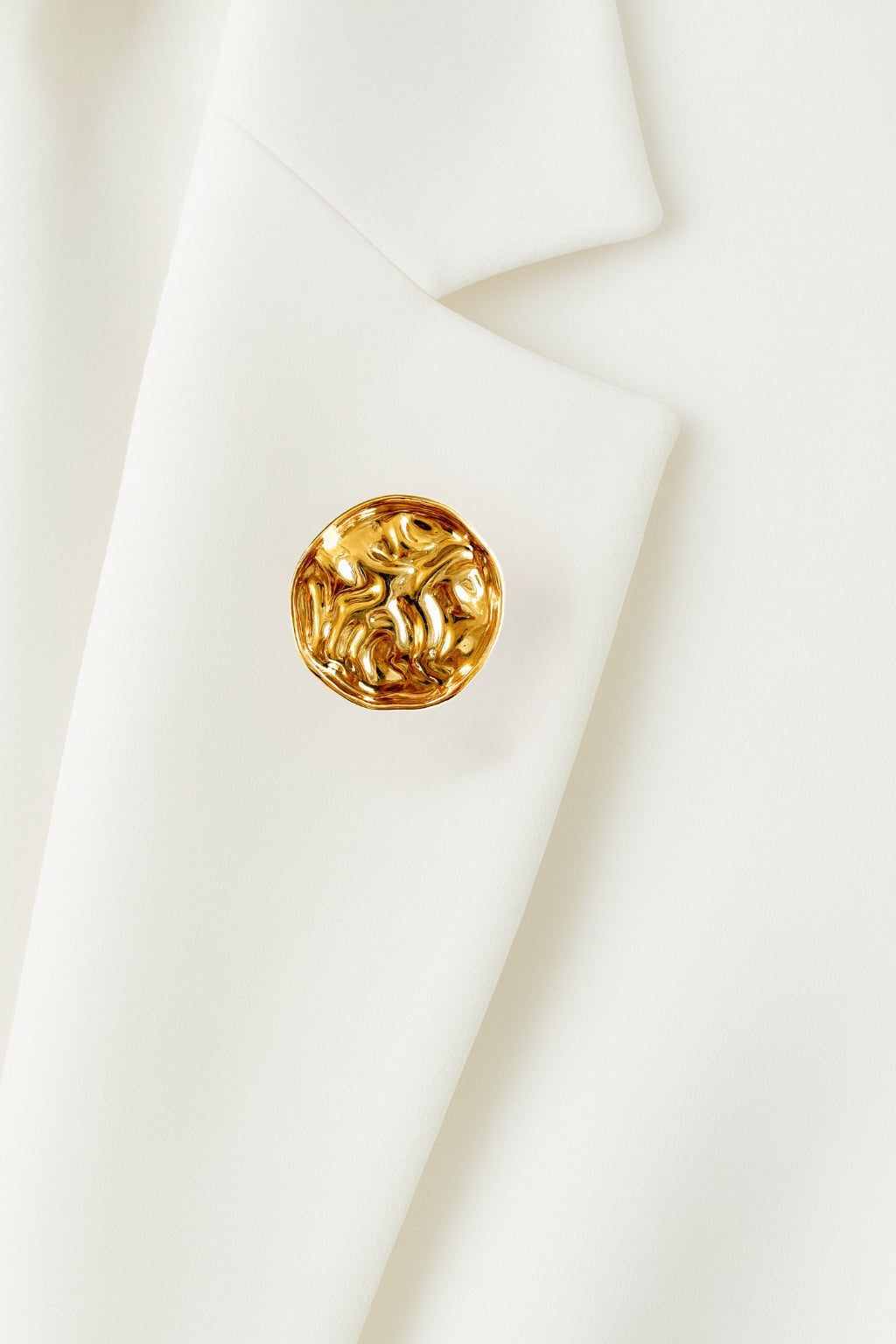 Guld broche
