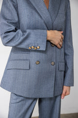 Pinstripe blazersæt med guldknapper.