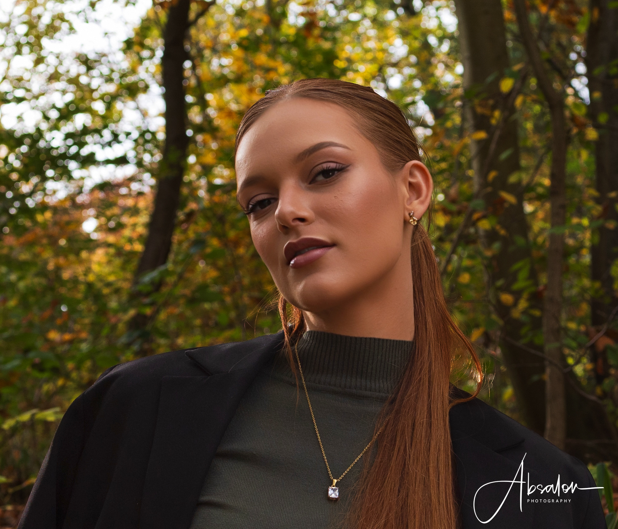 LA SUITs grønne rullekravebluse